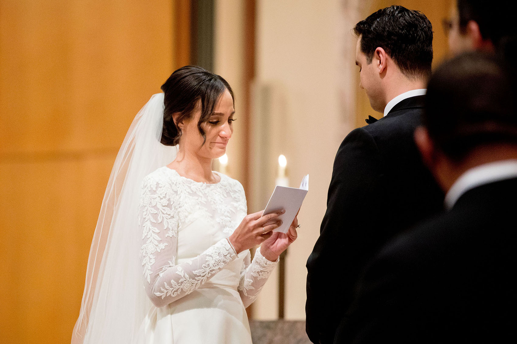 photo of a bride reading vows during a holy name cathedral documentary wedding
