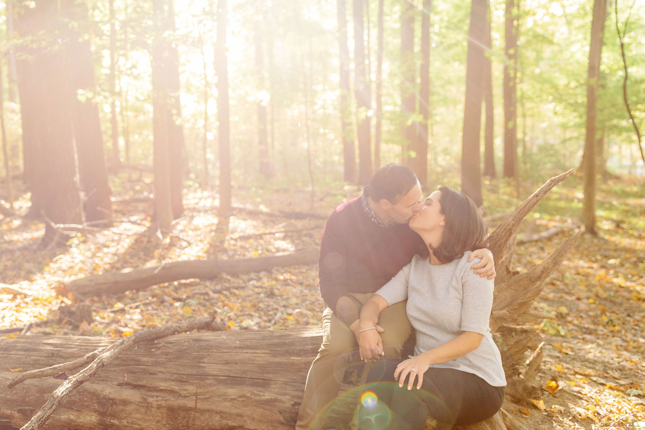 fall engagement photos in the forest in michigan