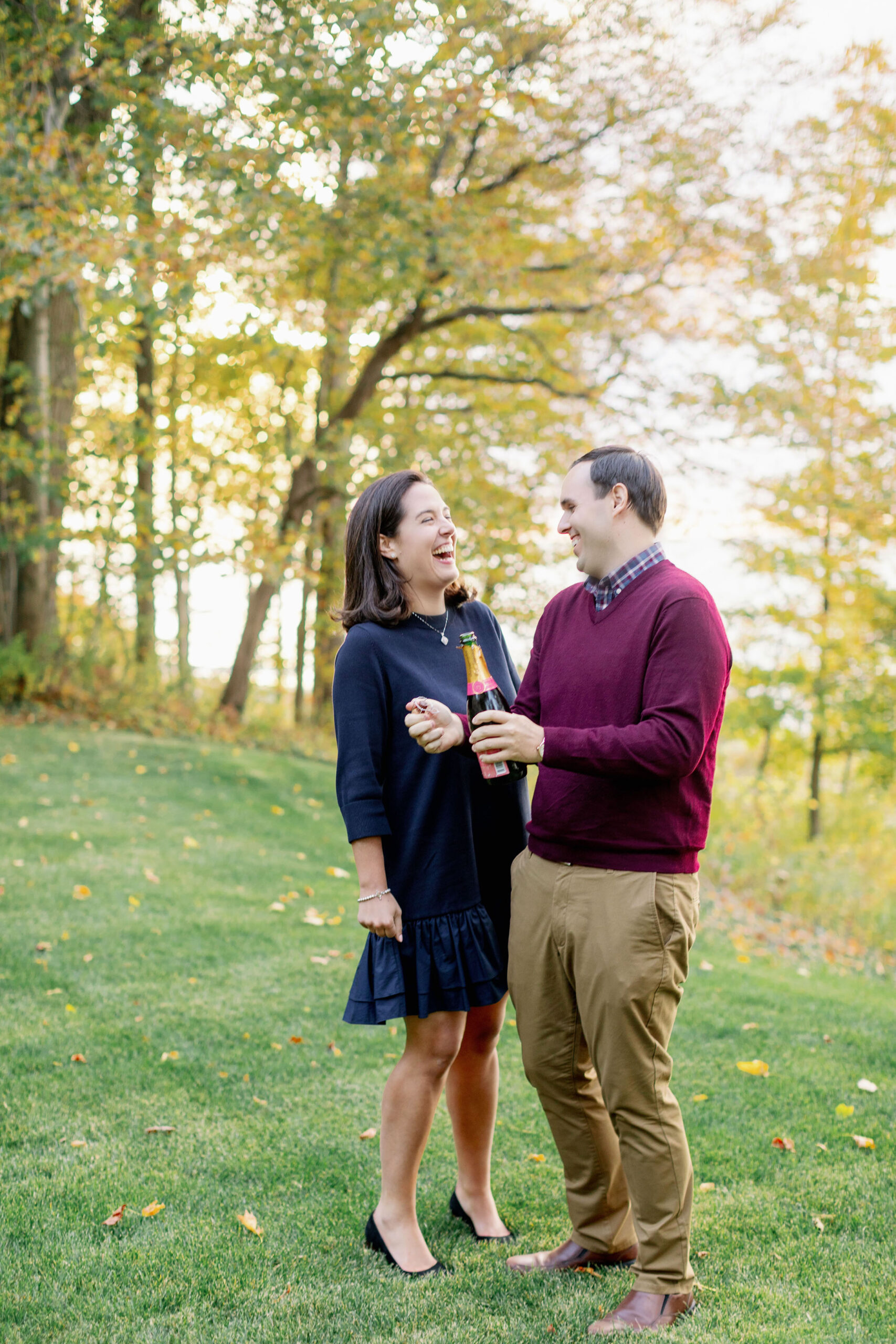 engagement photos on the lake during the fall in western michigan