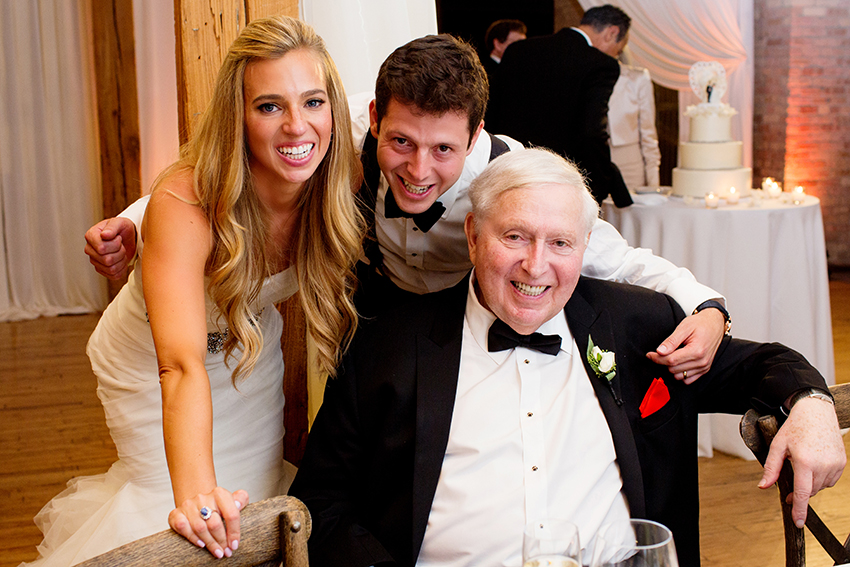 grandfather and couple at wedding